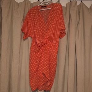 Orange and white polka dot dress